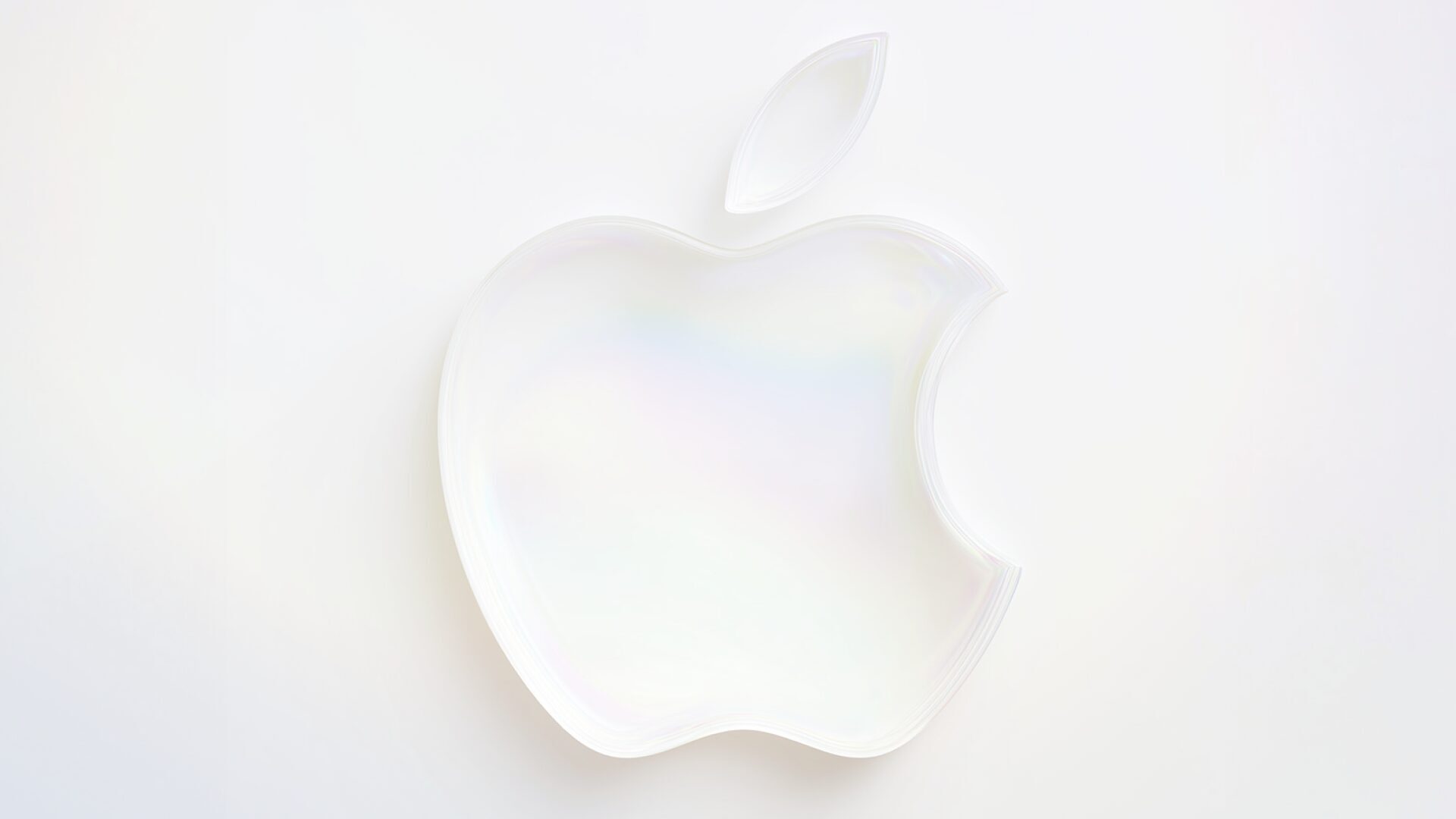 Stylized Apple logo with a translucent, iridescent liquid-glass effect.
