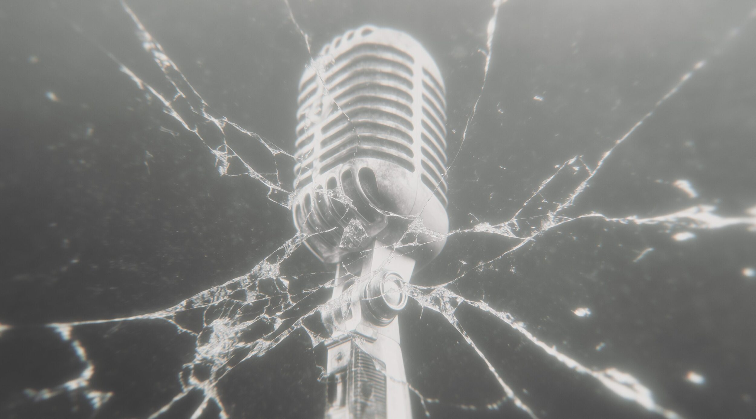 Vintage-style microphone seen through a shattered glass surface, rendered in a hazy monochrome with soft focus and glowing highlights.