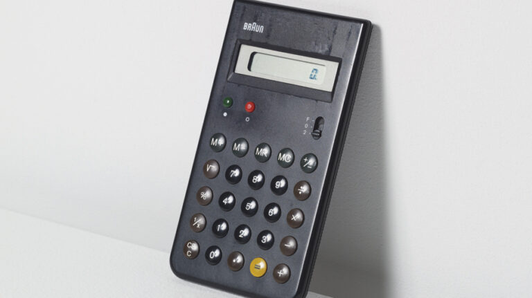 Braun ET66 calculator designed by Dietrich Lubs and Dieter Rams, featuring a minimalist black enclosure, circular tactile buttons, and a clean functional layout that became an icon of industrial design.